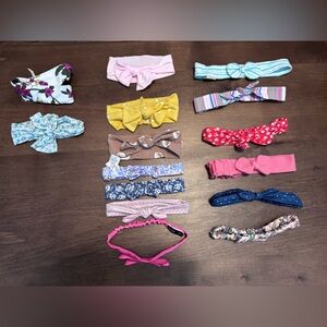 Colorful Infant headbands- lot of 15 varying sizes and styles.